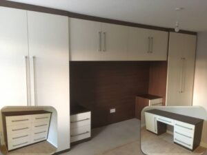 walnut and ivory fitted bedroom furniture